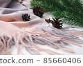 Cashmere scarf with fir branches and cones. New Year's mood. 85660406