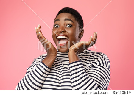 Joyful Black Female Shouting Holding Hands Near Face, Pink Background Joyful Black Female Shouting Holding Hands Near Face, Pink Background 85660619