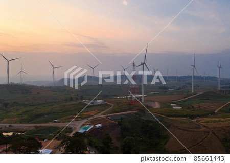 Wind turbines of alternative energy with clean and renewable on hill in agriculture fields 85661443