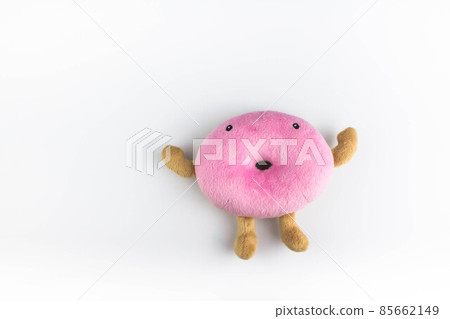 Top view of pink funny plush donut toy on isolated white background Top view of pink funny plush donut toy on isolated white background 85662149
