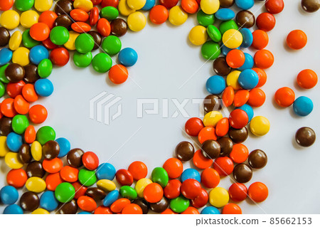 heart made of candy on a white background. the heart of the bright jelly beans. a sweet gift for Valentine's day heart made of candy on a white background. the heart of the bright jelly beans. a sweet gift for Valentine's day 85662153
