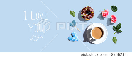 I love you message with a cup of coffee and a donut 85662391