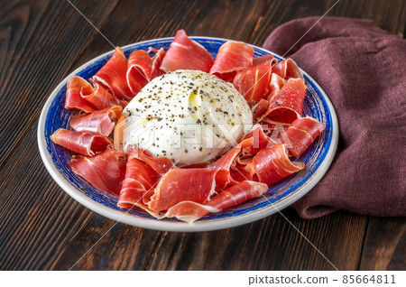 Antipasto with prosciutto and mozzarella 85664811