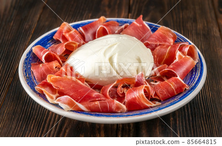 Antipasto with prosciutto and mozzarella 85664815