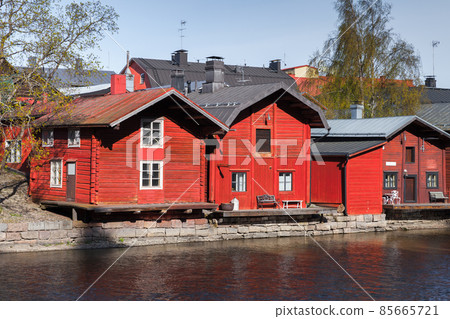 Red wooden houses and barns, Porvoo, Finland 85665721
