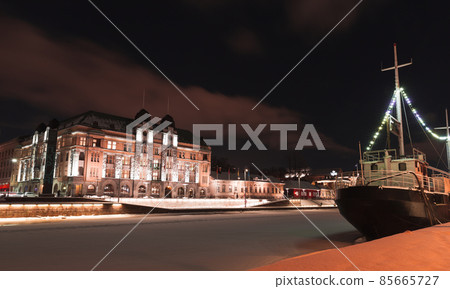 Turku cityscape at night. Illuminated houses and ships Turku cityscape at night. Illuminated houses and ships 85665727