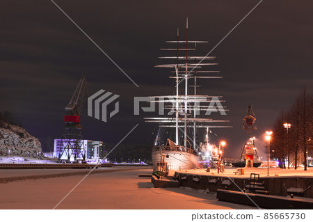 Old sailing boat is moored in Turku harbor at night, Finland 85665730