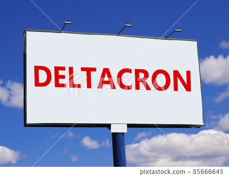 Covid-19 corona deltacron symbol. The concept word Deltacron on white billboard. Beautiful blue sky. Medical and COVID-19 corona deltacron concept. Copy space. 85666645
