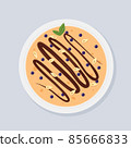 Thin pancake with chocolate, blueberries and peanuts.  85666833