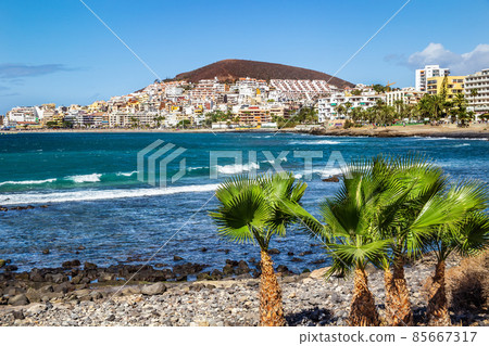Landscape of the coastline of the popular resort in the southern part of Canary Island. Los Cristianos, Tenerife, Spain. 85667317