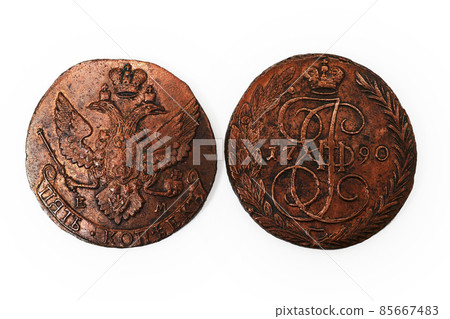 two old Russian copper coins of the 18th century on white two old Russian copper coins of the 18th century on white 85667483