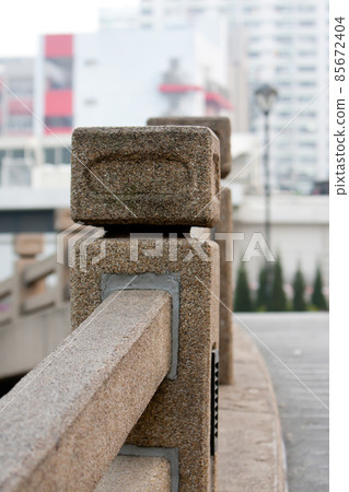 a Stone railing sculpture at the Tuen Mun park 85672404