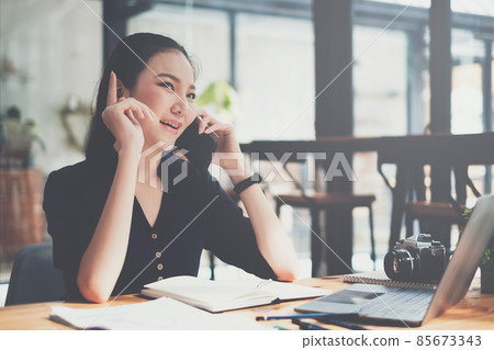 A young asian lady excited when product sale. woman using shopping application on laptop computer. online shopping concept. 85673343