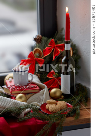christmas treats and decorations on sill 85675405