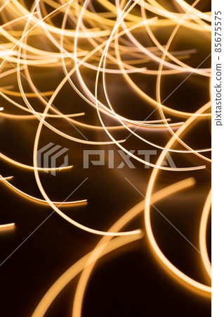 golden electric light effect on dark background golden electric light effect on dark background 85675575