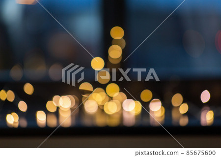 golden lights on window sill in darkness golden lights on window sill in darkness 85675600