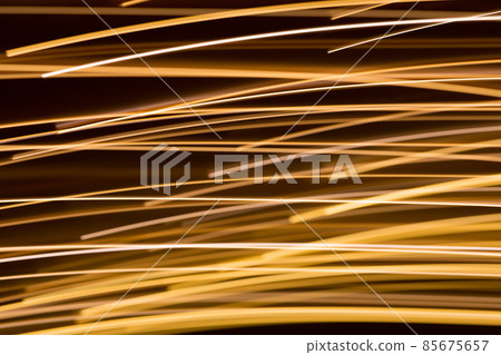 golden electric light effect on dark background golden electric light effect on dark background 85675657