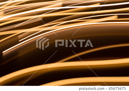 golden electric light effect on dark background golden electric light effect on dark background 85675675