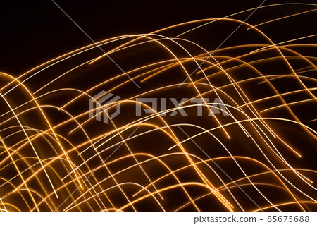 golden electric light effect on dark background 85675688