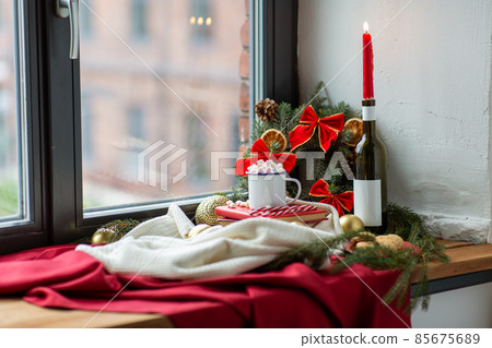 christmas treats and decorations on window sill christmas treats and decorations on window sill 85675689