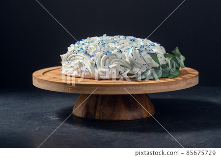 close up of zephyr cake on wooden stand close up of zephyr cake on wooden stand 85675729