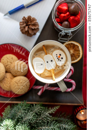 marshmallow snowman in cup of coffee on christmas marshmallow snowman in cup of coffee on christmas 85675747