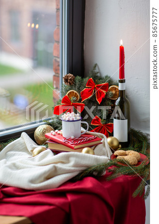 christmas treats and decorations on window sill 85675777