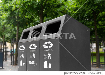 trash container for waste sorting on city street 85675893