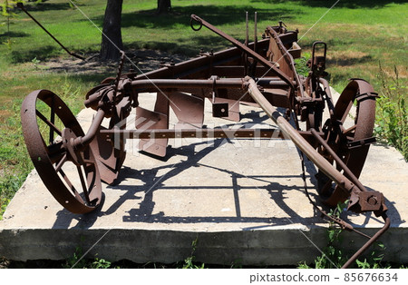 Old agricultural machinery used to work in the fields in Israel Old agricultural machinery used to work in the fields in Israel 85676634