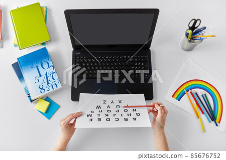 teacher with alphabet having online class at home teacher with alphabet having online class at home 85676752