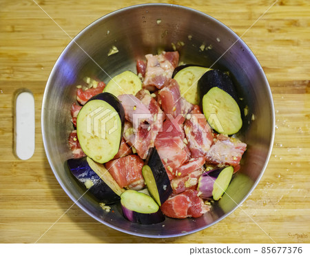 Close up shot of home growth eggplant with pork meat 85677376