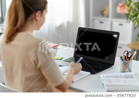 student woman with laptop, notebook and book student woman with laptop, notebook and book 85677920