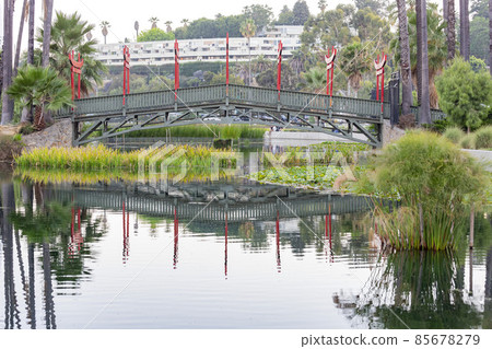 Japanese style bridge by the lake Japanese style bridge by the lake 85678279