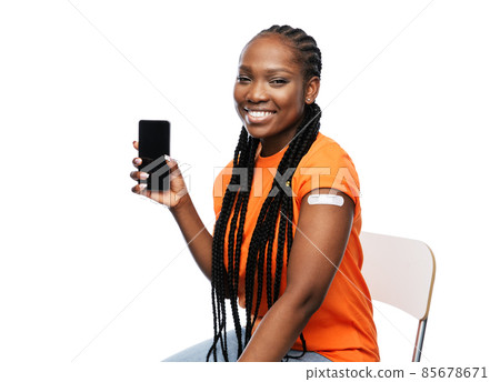 happy vaccinated woman and smartphone happy vaccinated woman and smartphone 85678671