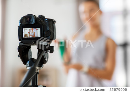 teenage girl or blogger recording gym class video 85679906