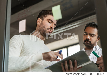 businessmen with folder working at office businessmen with folder working at office 85680474