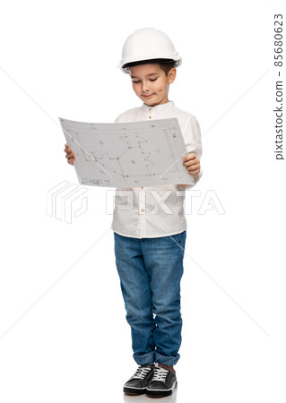 little boy in construction helmet with blueprint little boy in construction helmet with blueprint 85680623