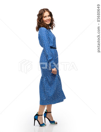 happy smiling beautiful young woman in blue dress 85680649
