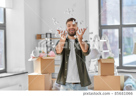 happy man with foam peanut moving to new home happy man with foam peanut moving to new home 85681066