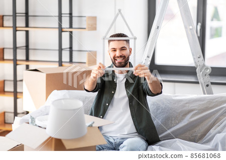 happy man with boxes moving to new home happy man with boxes moving to new home 85681068
