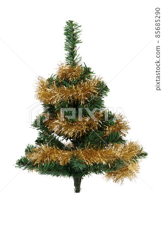 The Christmas tree is decorated with gold tinsel. 85685290
