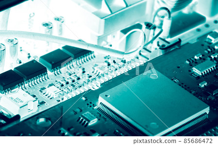 Electronic circuit board. Semiconductor motherboard circuit board technology. Mainboard of computer. Integrated semiconductor microchip on green circuit board. Hi-tech industry and computer science. 85686472