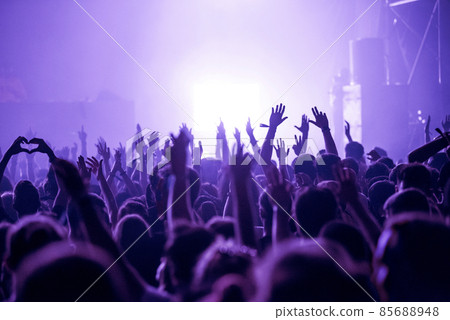 Crowd of people celebrating the New Year's Eve at a party Crowd of people celebrating the New Year's Eve at a party 85688948