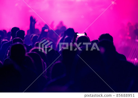 Crowd of people celebrating the New Year's Eve at a party Crowd of people celebrating the New Year's Eve at a party 85688951