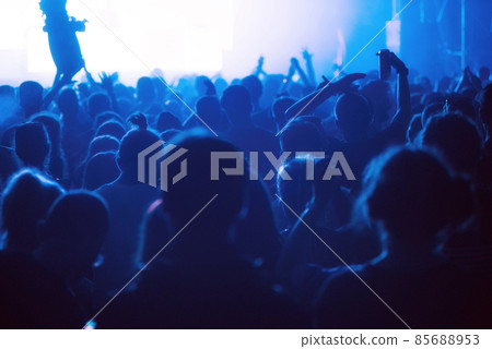 Crowd of people celebrating the New Year's Eve at a party Crowd of people celebrating the New Year's Eve at a party 85688953