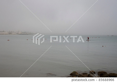 Dream sports scene banner in the mist at dawn in the calm sea. Dream sports scene banner in the mist at dawn in the calm sea. 85688966