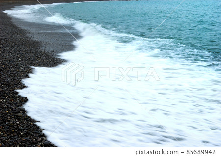 deserted beach, bad weather and calm sea, not season 85689942