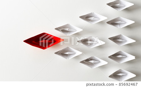 Leadership concept. Red paper ship lead among white. One leadership leads other ships. 85692467