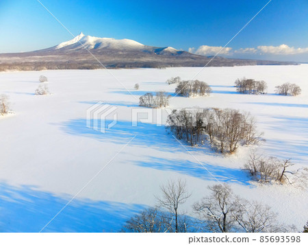 Aerial view of the frozen scenery of Onuma in Nanae-cho, Hokkaido in winter 85693598