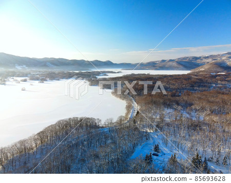 Aerial view of the frozen scenery of Onuma in Nanae-cho, Hokkaido in winter 85693628